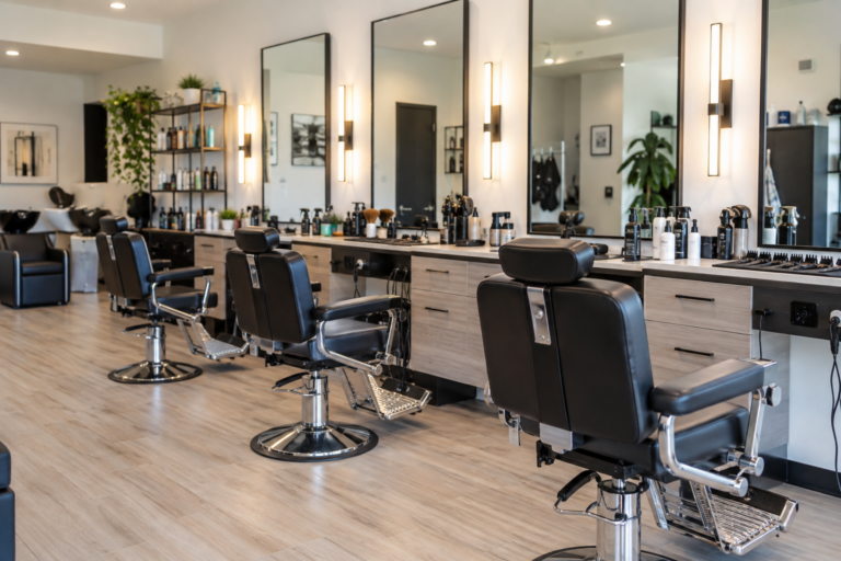 Interior of a casual walk-in hair salon with barber chairs and clipper tools