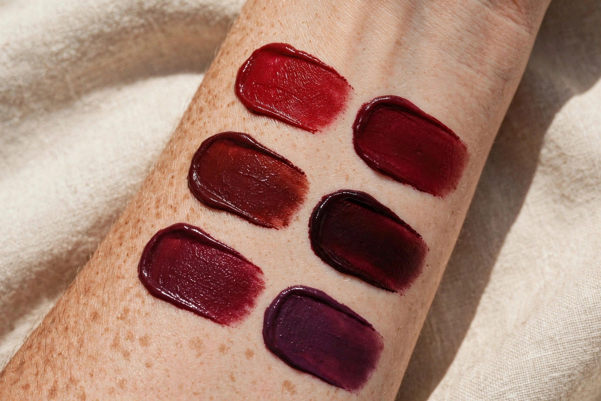 Dark cherry and burgundy lipstick shade swatches